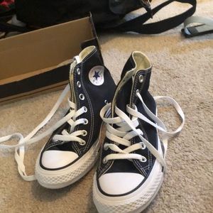 Black and white classic high top converse